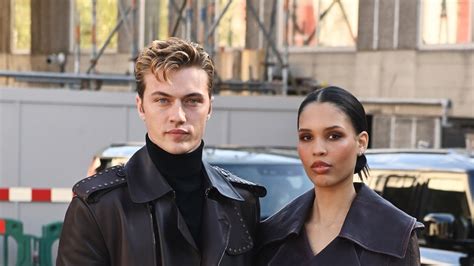 Nara Smith and Lucky Blue Smith Twin in Trench Coats at 